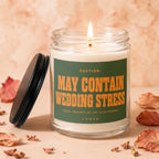 Candle with text: CAUTION: MAY CONTAIN WEDDING STRESS. VOWED.