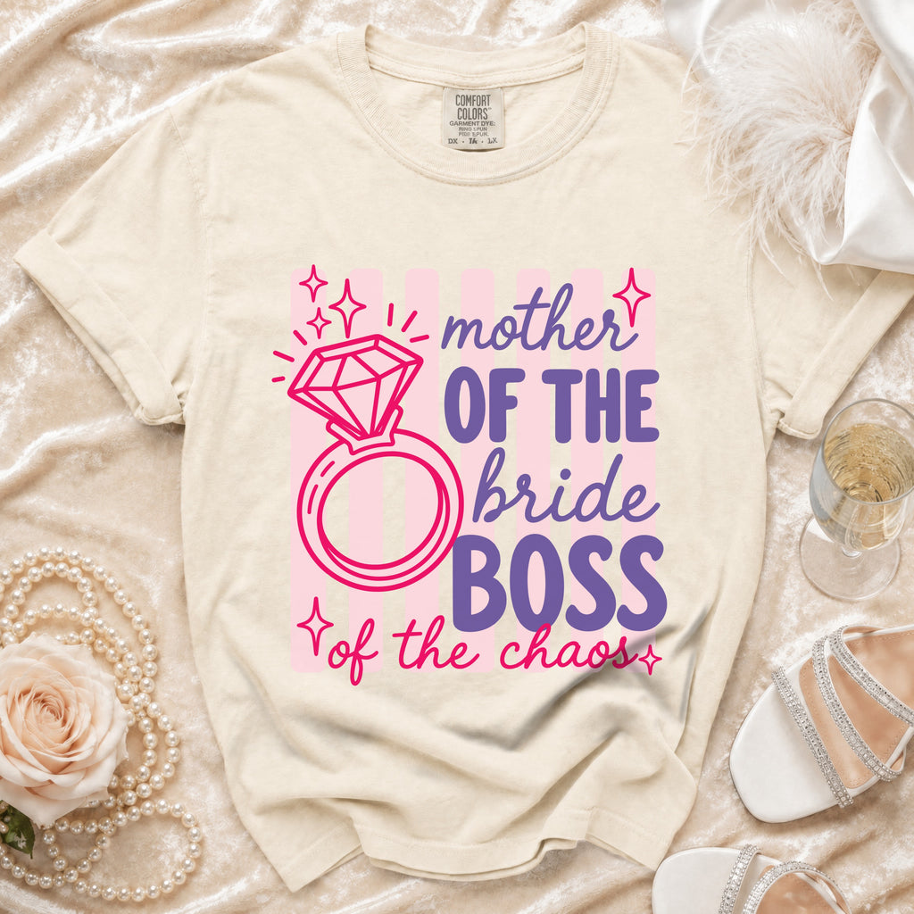 T-shirt with "Mother of the Bride Boss of the Chaos" text and diamond ring graphic.