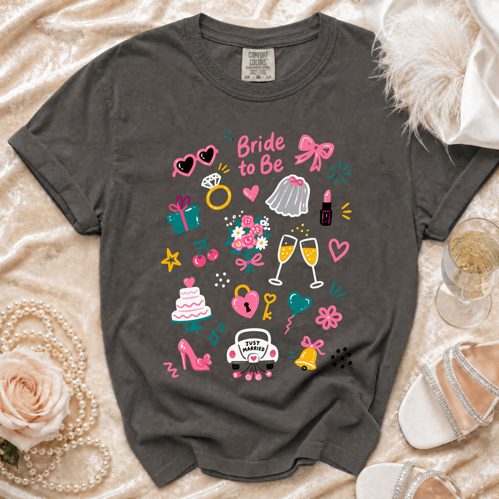 Dark gray t-shirt with "Bride to Be" and wedding icons in bright colors.