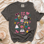 Dark gray t-shirt with "Bride to Be" and wedding icons in bright colors.