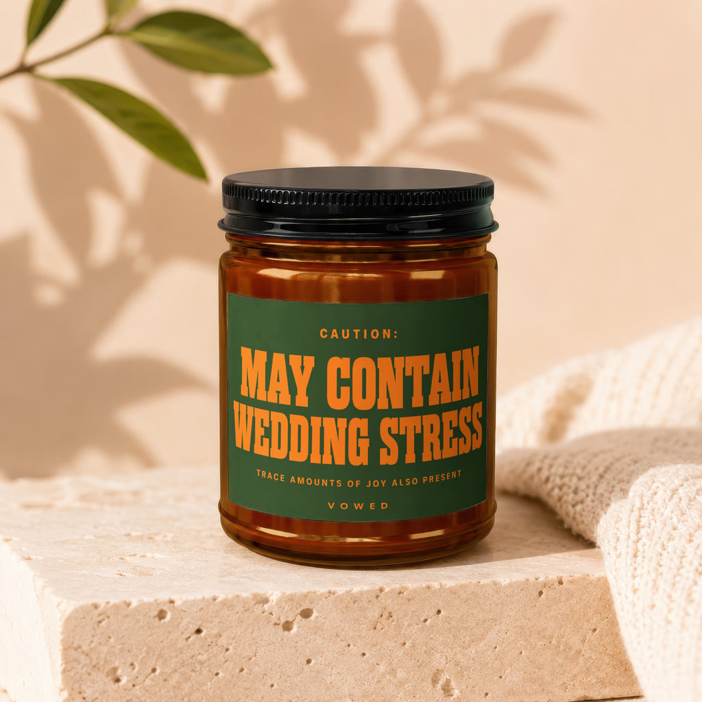 Candle with "May Contain Wedding Stress" label.