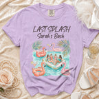 Purple t-shirt with "Last Splash Sarah's Bach" and girls on a pool float.
