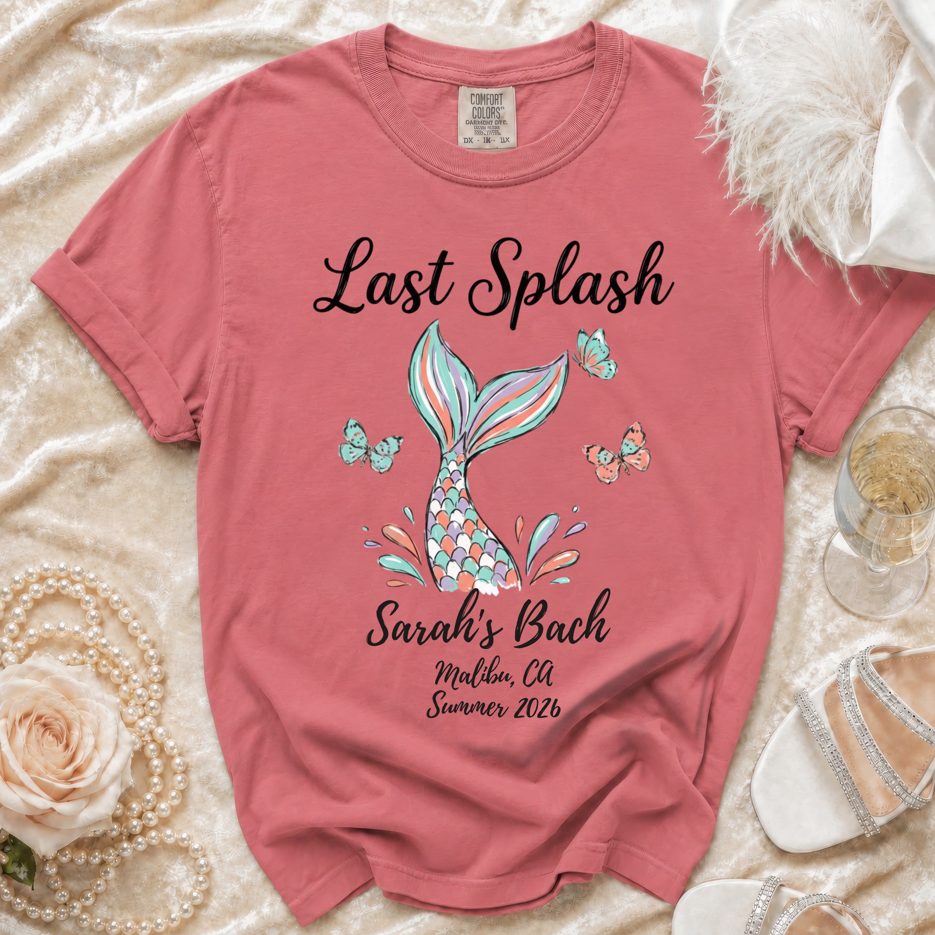 Coral t-shirt with "Last Splash Sarah's Bach Malibu, Ca Summer 2026" text.
