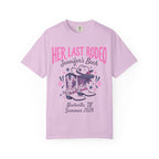 Pink t-shirt with "Her Last Rodeo" text, cowboy boots, and Nashville, TN Summer 2026.