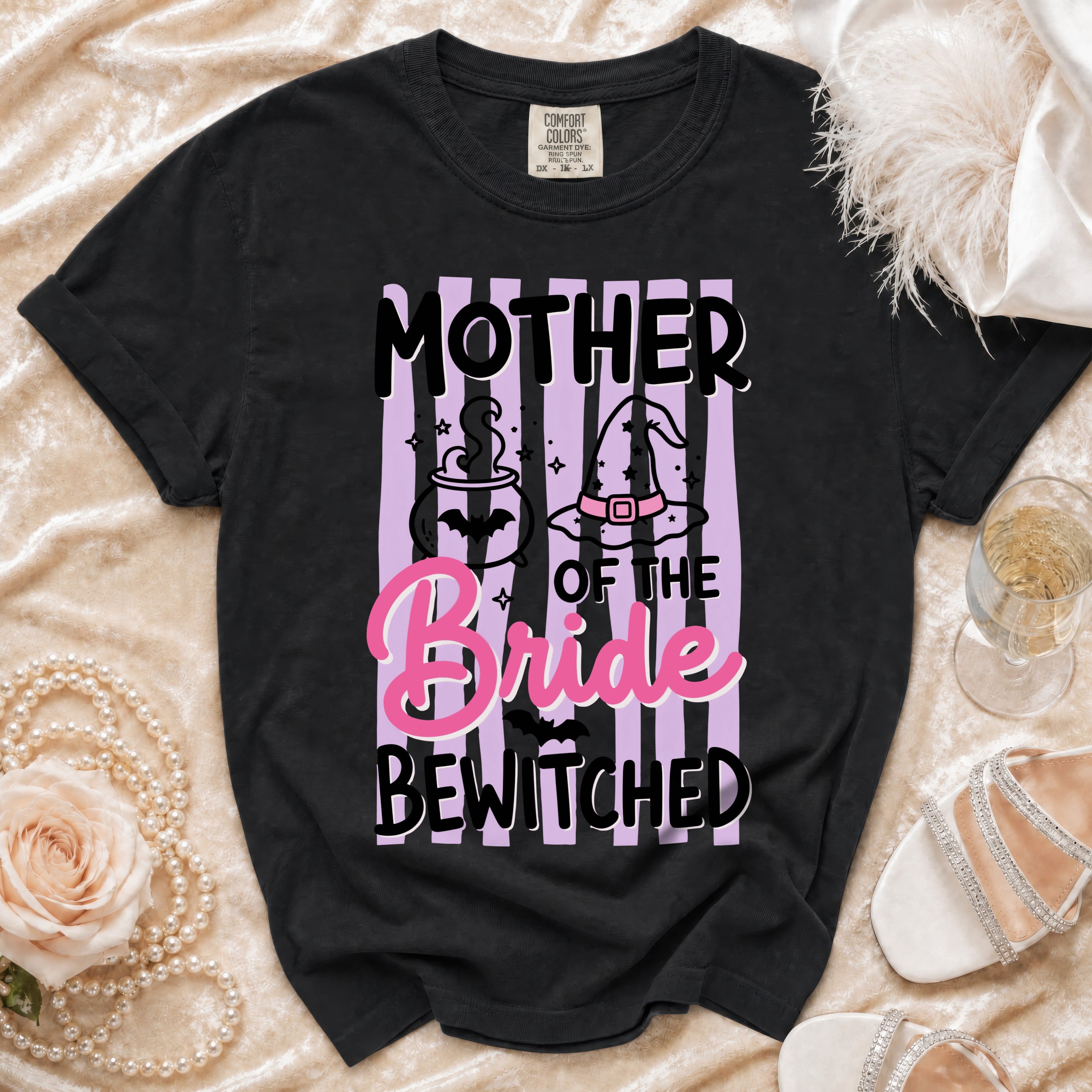 Black t-shirt with "Mother of the Bride Bewitched" Halloween-themed graphic.
