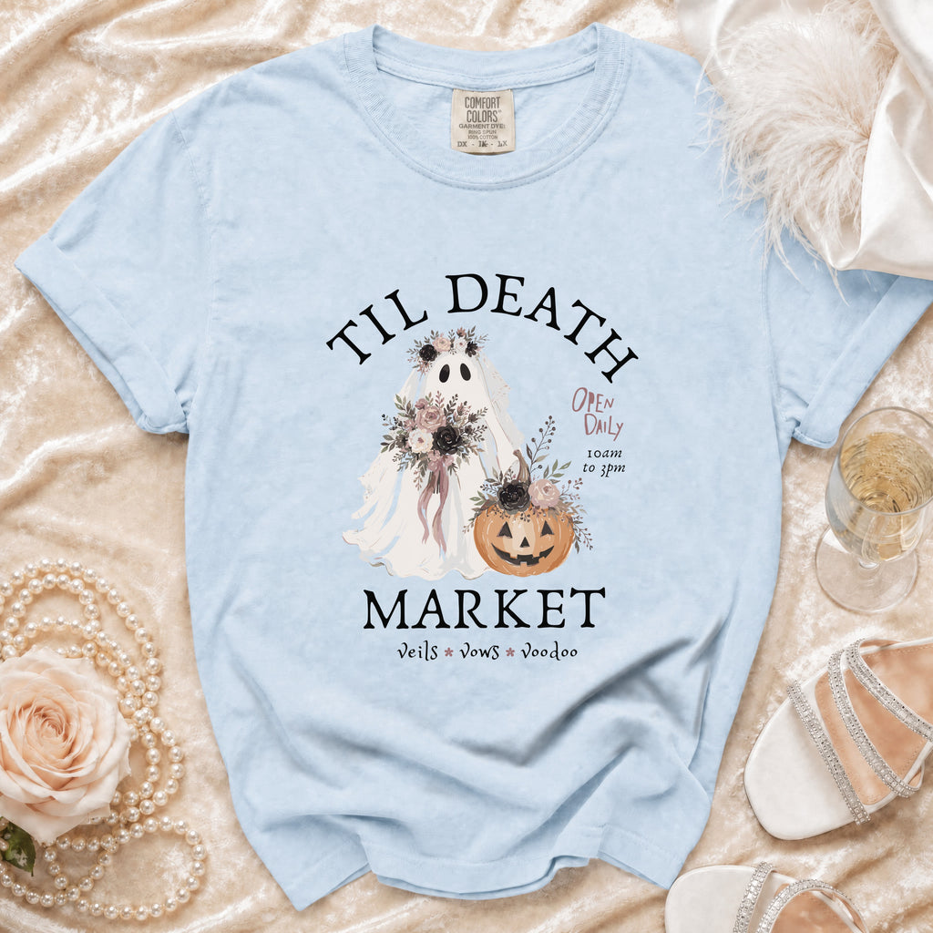 Light blue t-shirt with ghost, pumpkin, and text "Til Death Market".