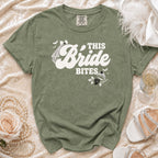 Green t-shirt with white "This Bride Bites" text, bat, veil, and ring graphics.