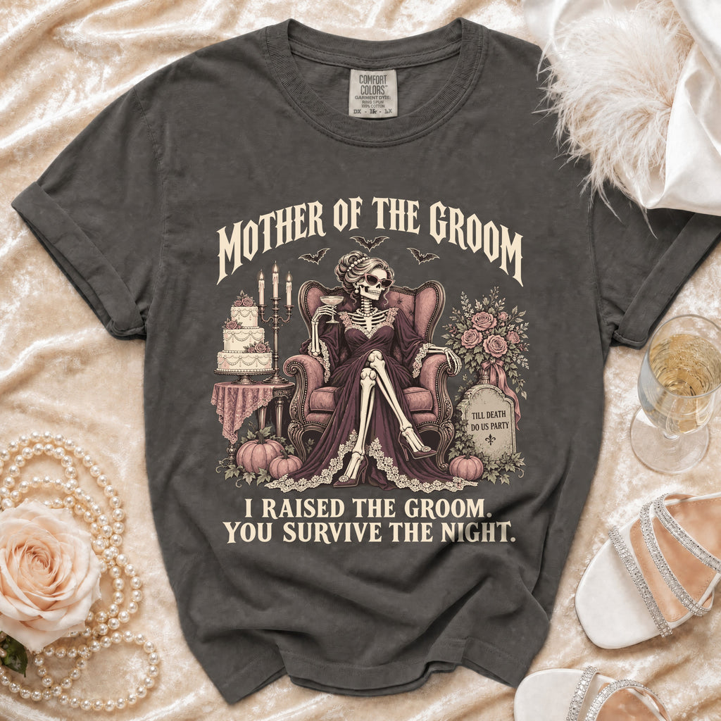 Dark t-shirt with "Mother of the Groom" skeleton graphic and humorous text.