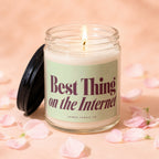 Glass candle with 'Best Thing on the Internet' text and 'Vowed Candle Co.'