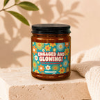 Glass jar with "Engaged and Glowing! With All The Sparkle" text and floral pattern.