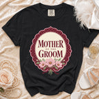 Black t-shirt with "Mother of the Groom" text and floral design.