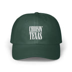A dark green baseball cap featuring white embroidered text that reads CHOOSIN TEXAS on the front panel.