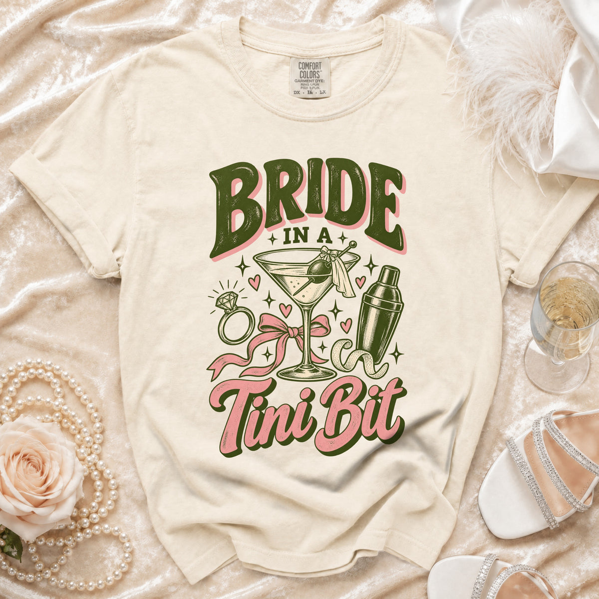 Bride in a Tini Bit graphic tee with martini, shaker, ring, and pearls.