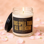 Jar candle with lit wick and black lid, "This Spell Took All Weekend" text.