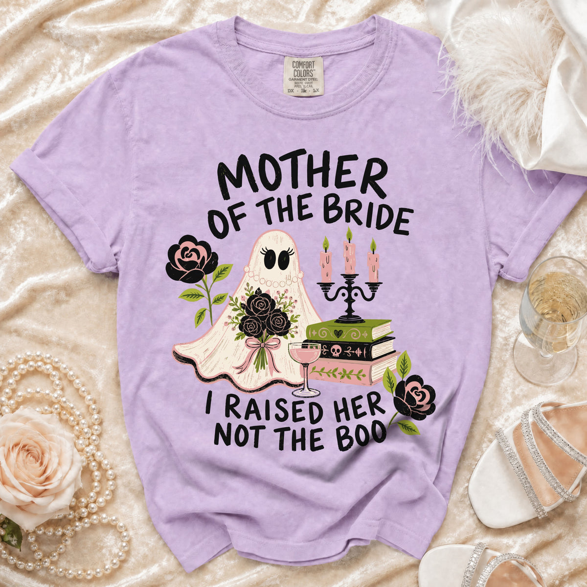 Purple t-shirt with "Mother of the Bride I Raised Her Not the Boo" graphic.