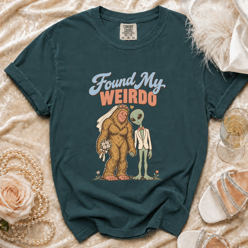 T-shirt with Bigfoot in a wedding veil and alien in a suit, with "Found My Weirdo" text.