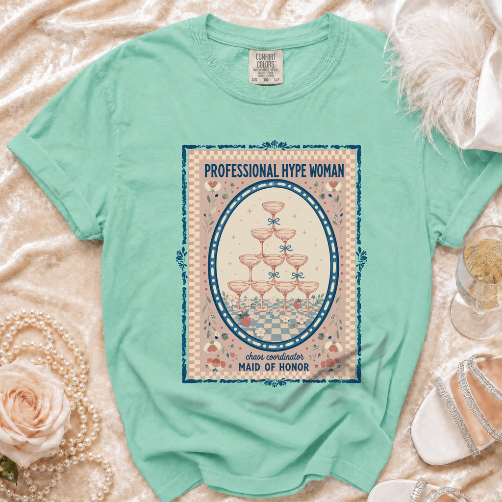 Mint green t-shirt with "Professional Hype Woman Chaos Coordinator Maid of Honor" graphic.