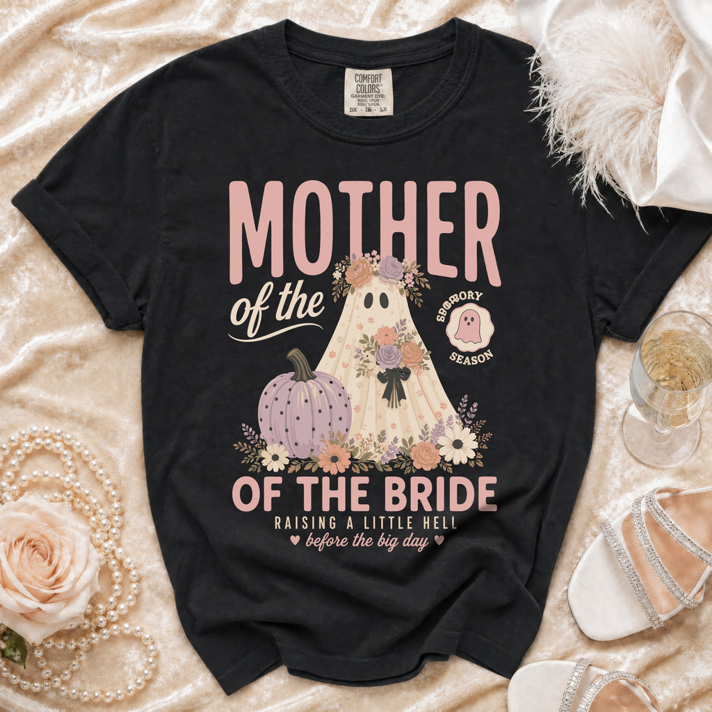 Black t-shirt with "Mother of the Bride" ghost, pumpkin, and floral graphic.