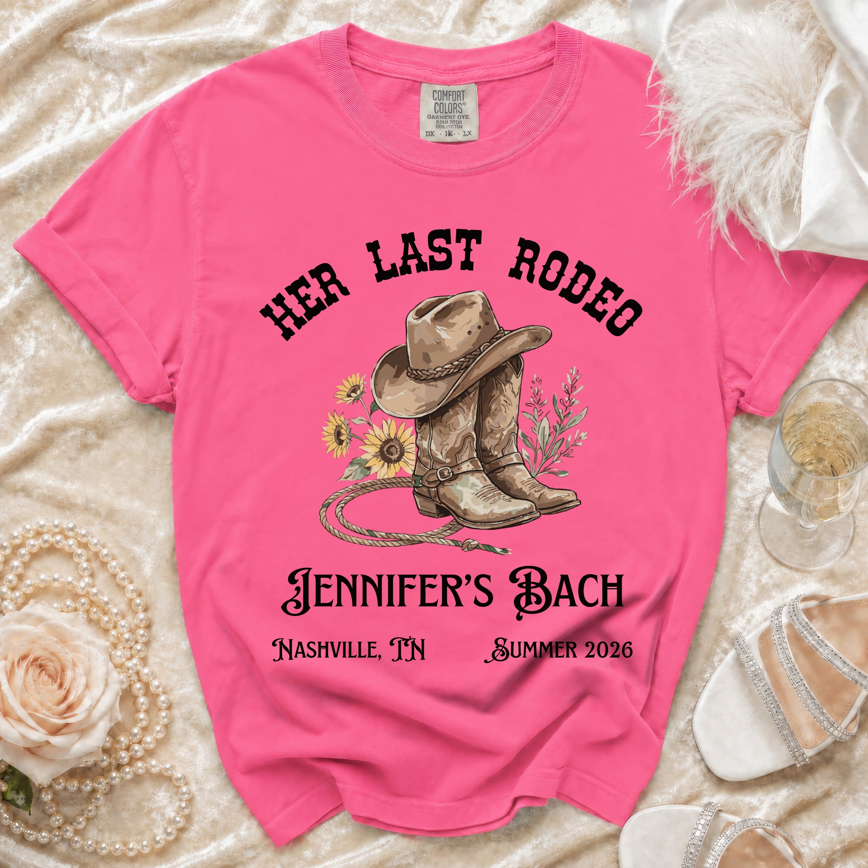 Pink t-shirt with "Her Last Rodeo Jennifer's Bach" and cowboy boots graphic.