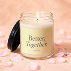 Glass jar candle with lit wick and "Better, Together." text.
