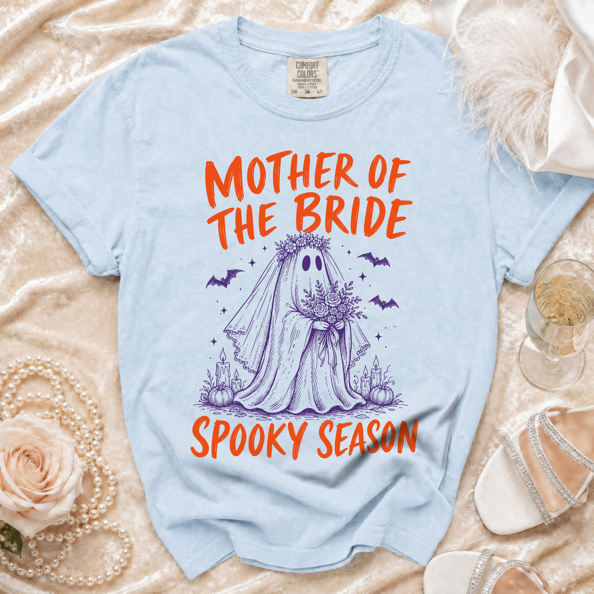Light blue t-shirt with "Mother of the Bride Spooky Season" text and a ghost bride graphic.