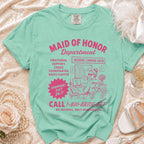 Mint green t-shirt with "Maid of Honor Department" graphic and "Call 1-800-BRIDE-BFF"