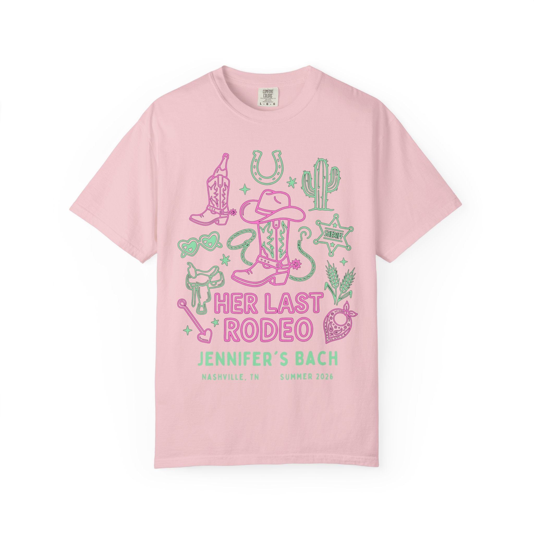Pink t-shirt with "Her Last Rodeo" cowboy-themed graphics and text.