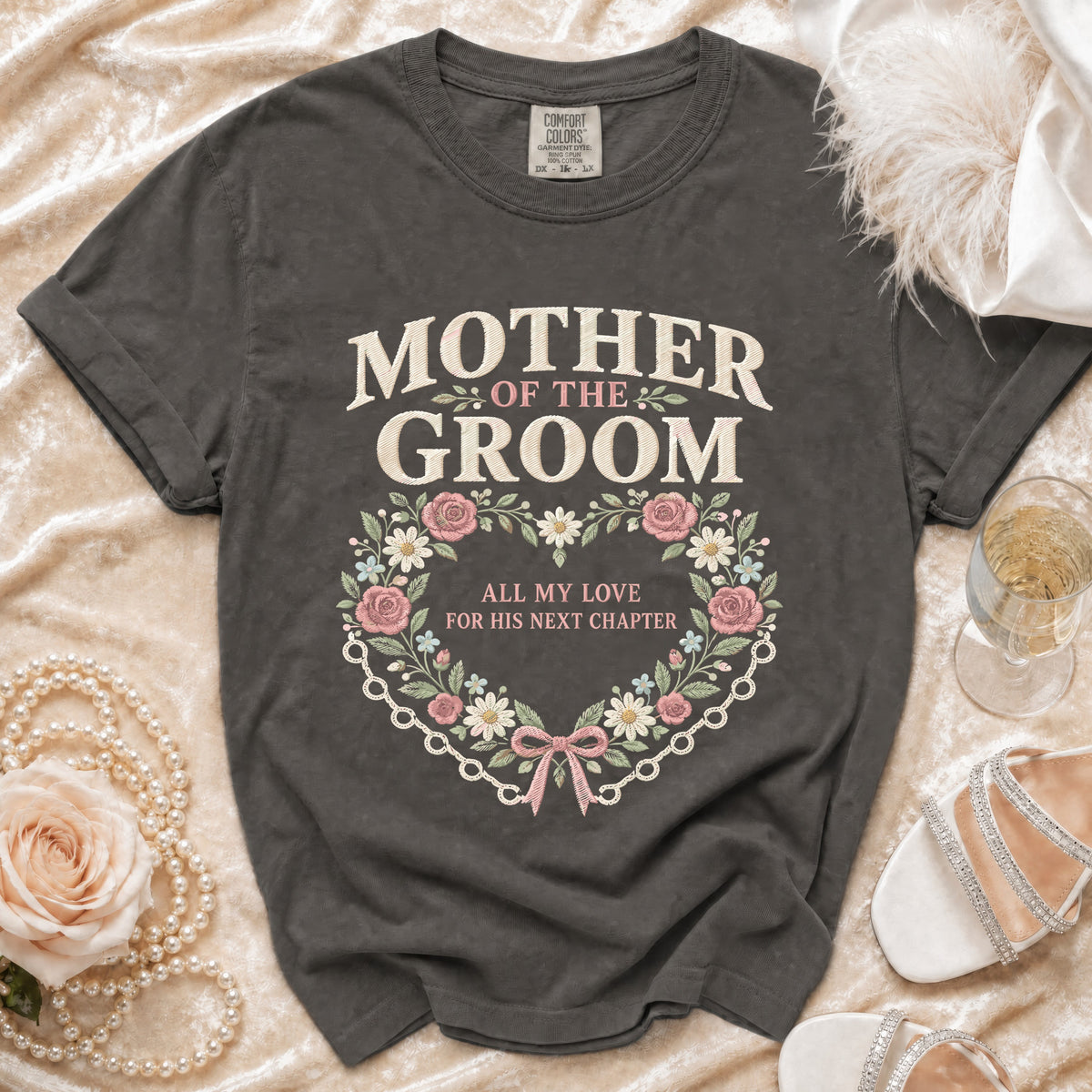 "Mother of the Groom" t-shirt with floral heart design and text.