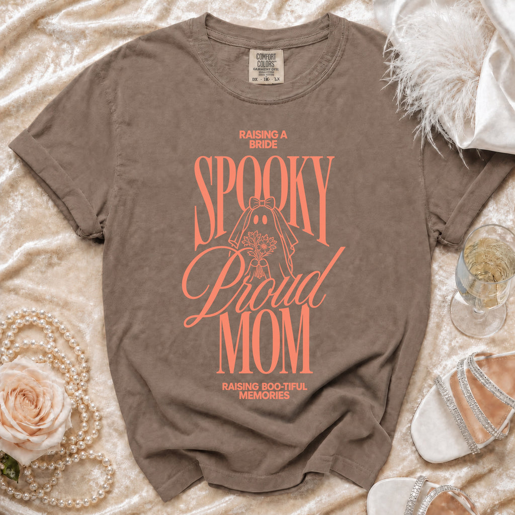 Comfort Colors t-shirt with "Raising a Bride, Spooky, Proud Mom, Raising Boo-tiful Memories" text.