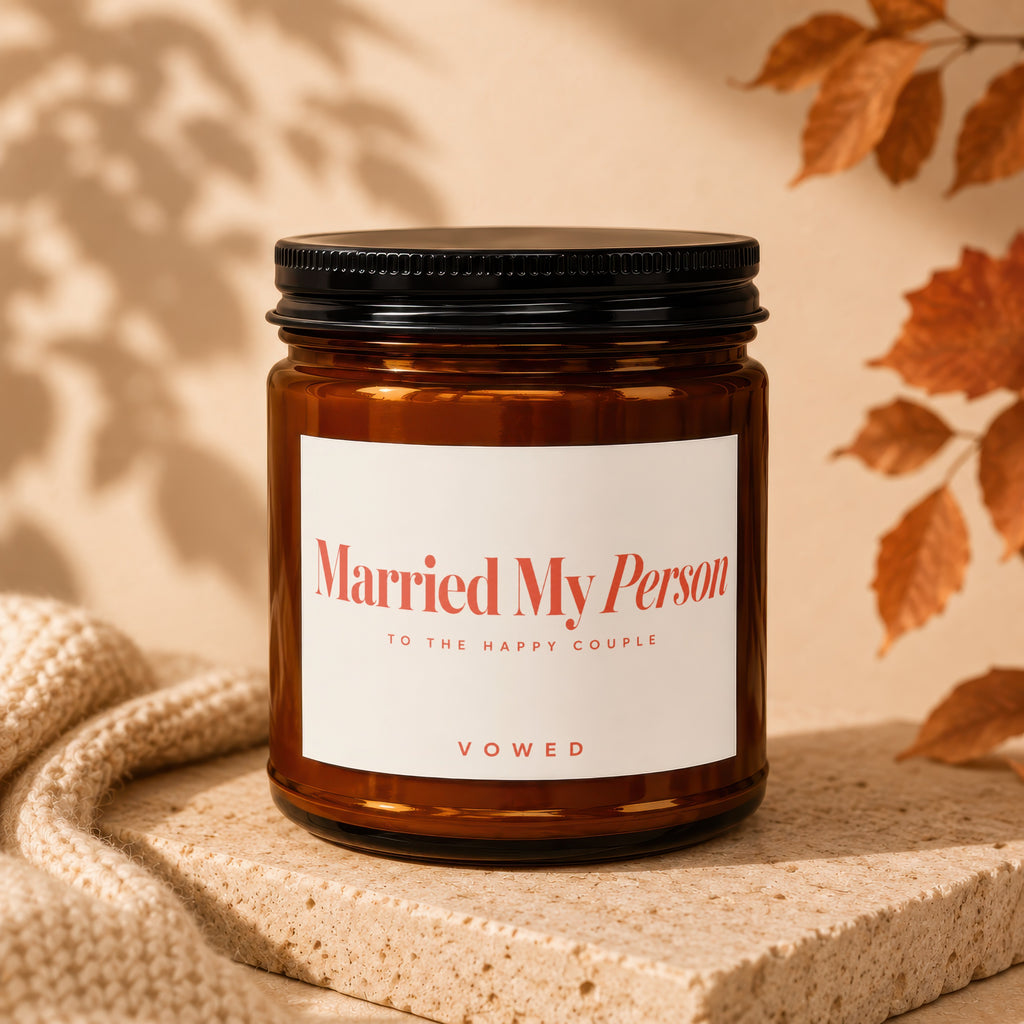 Amber candle with label reading "Married My Person TO THE HAPPY COUPLE VOWED".