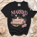 Black t-shirt with "MARRIED" text and wedding car graphic.