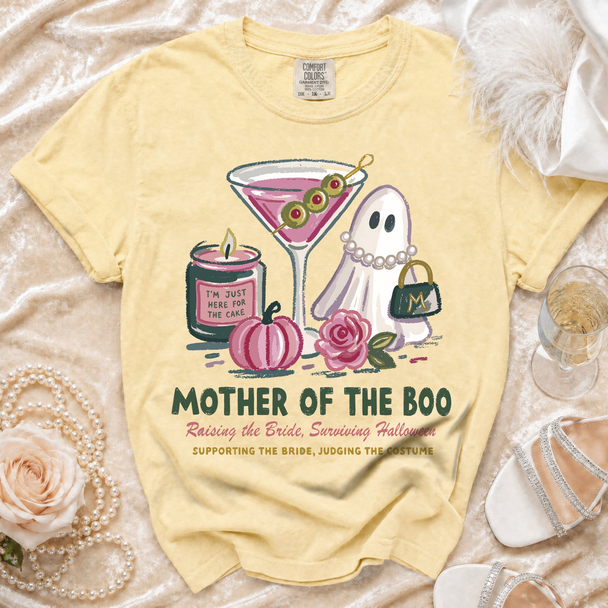 Yellow t-shirt with "Mother of the Boo" and Halloween graphics.