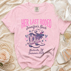 Pink t-shirt for "Her Last Rodeo" bachelorette with cowboy boots and hat.