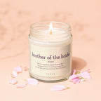 Candle with text "brother of the bride noun" and a humorous definition.