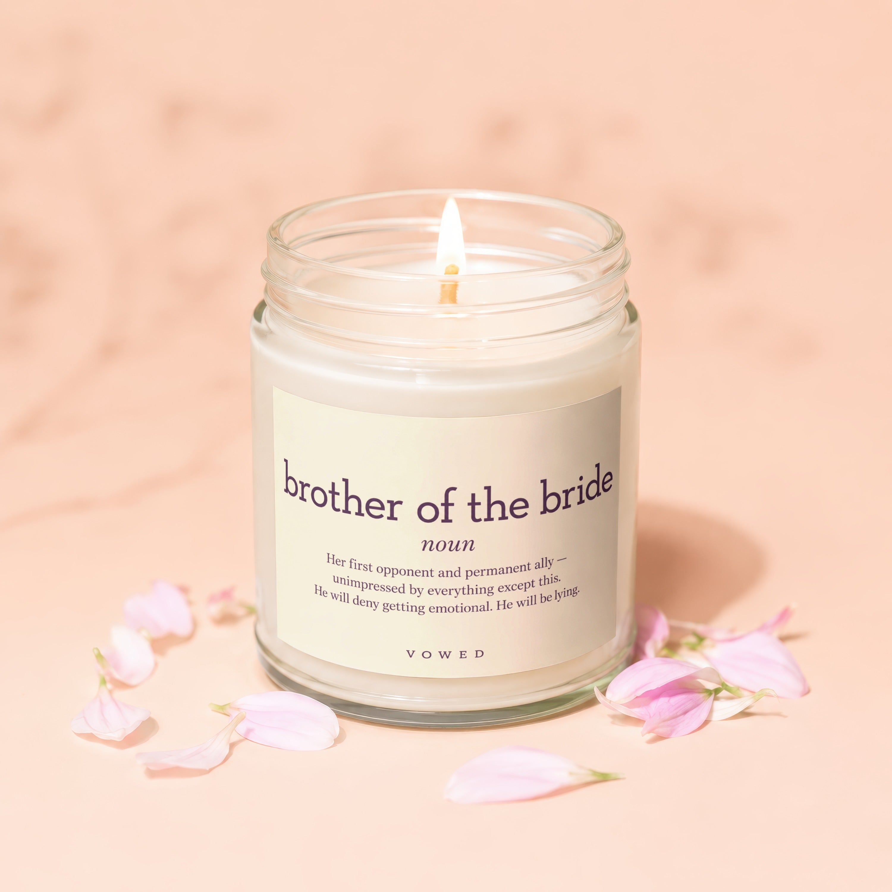 Candle with text "brother of the bride noun" and a humorous definition.