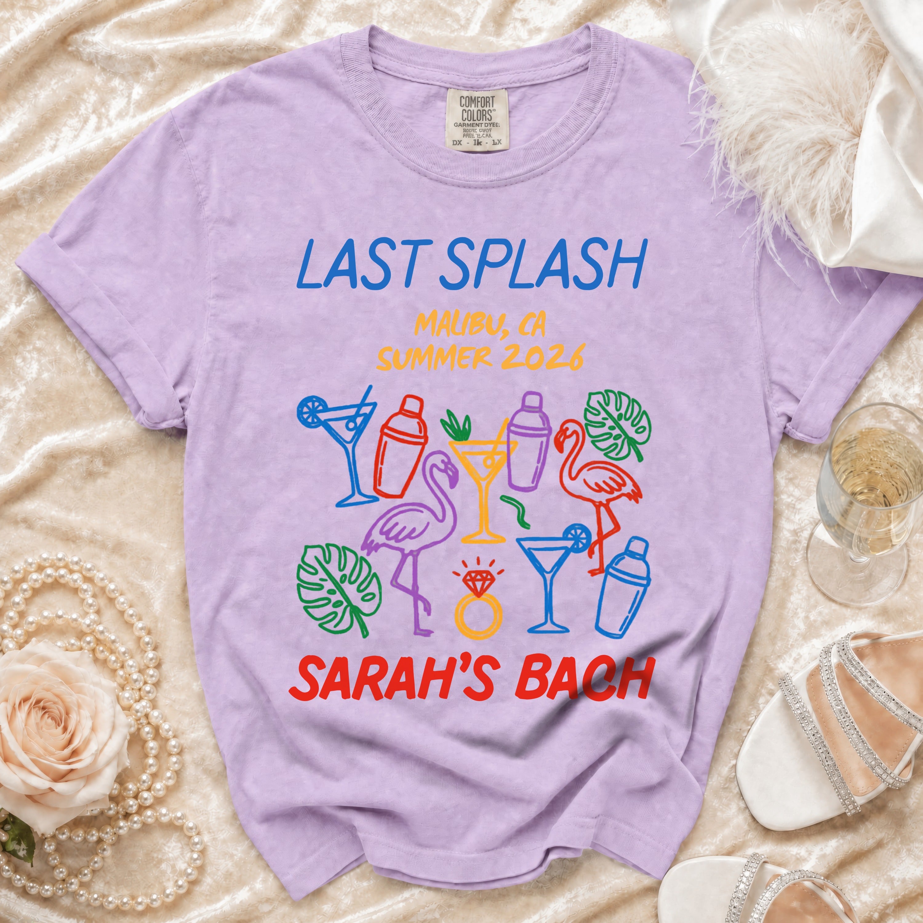 Lavender Comfort Colors t-shirt: "Last Splash, Malibu CA, Summer 2026, Sarah's Bach."