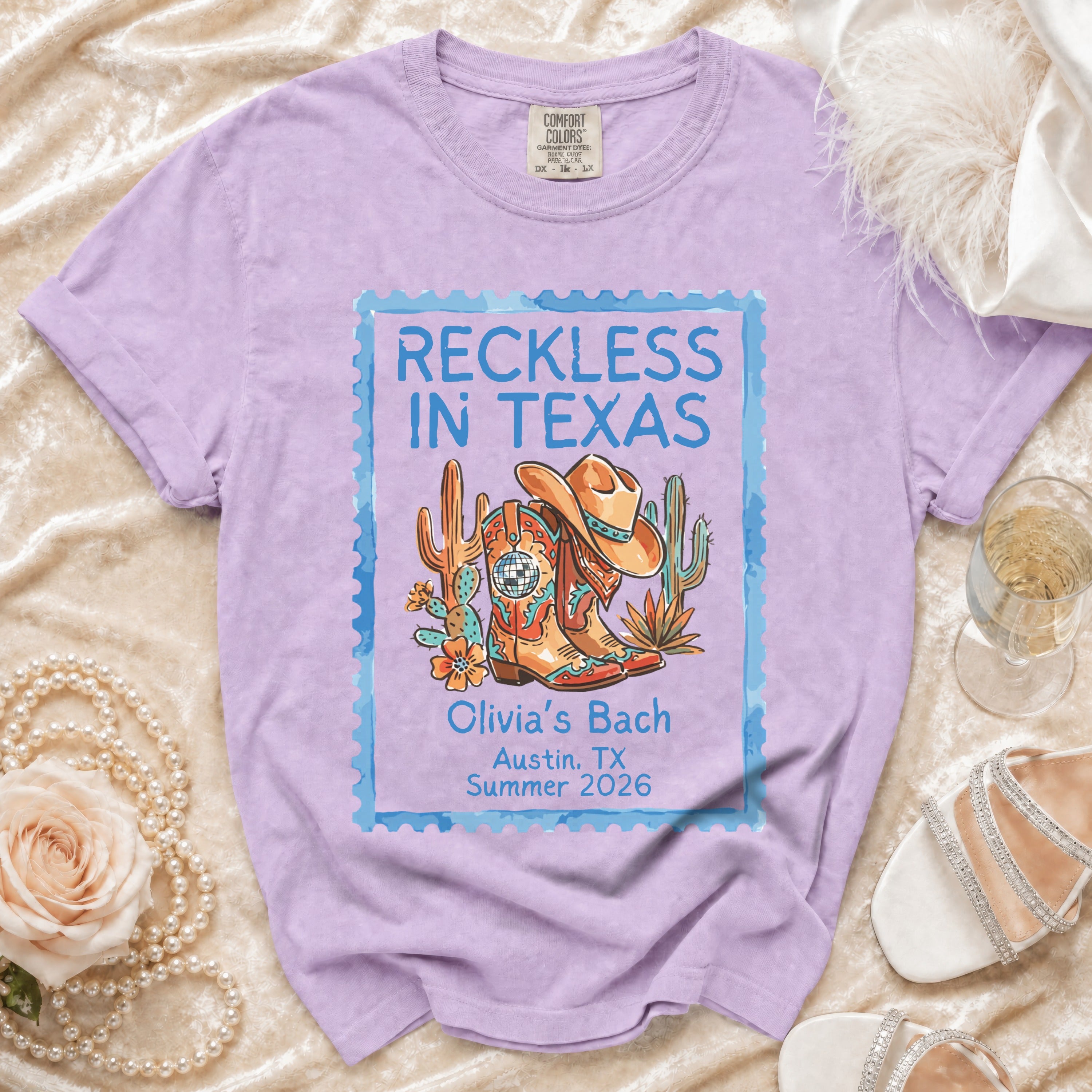T-shirt with "Reckless in Texas" and "Olivia's Bach Austin, TX Summer 2026" text.