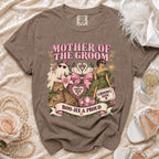 Brown t-shirt with "Mother of the Groom" graphic featuring leopard, swans, and disco ball.