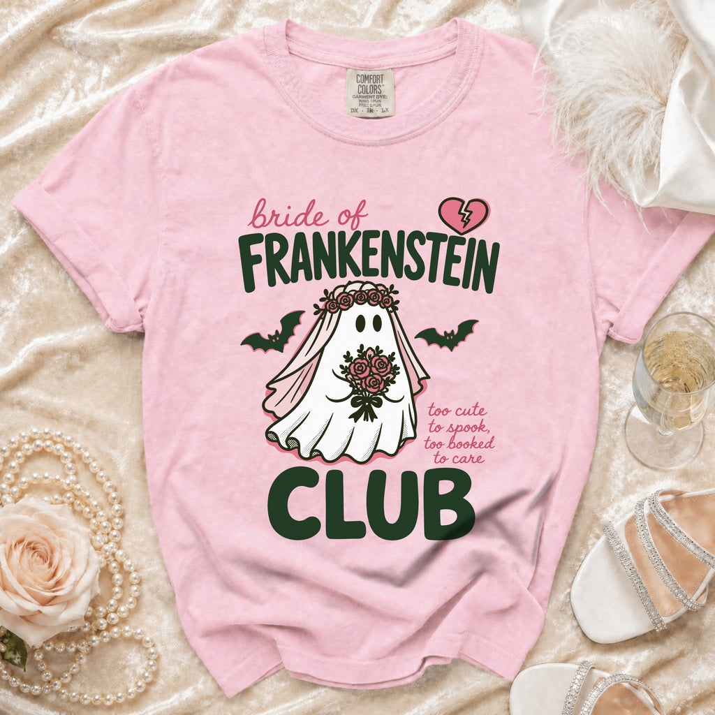 Pink t-shirt with Bride of Frankenstein ghost design and "CLUB" text.