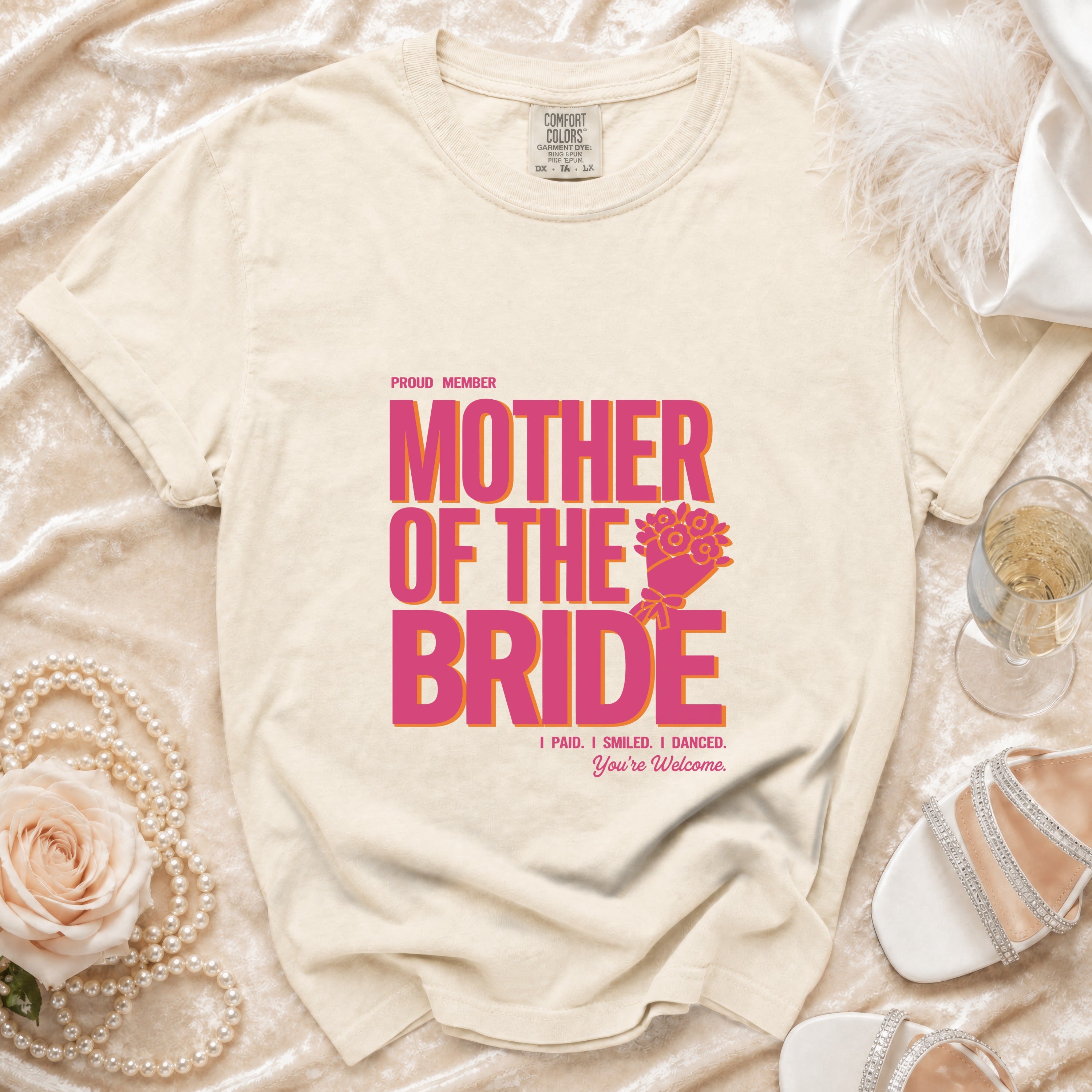 Cream t-shirt with "Mother of the Bride" text and floral graphic.