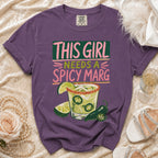 Purple t-shirt with "This Girl Needs a Spicy Marg" graphic and margarita illustration.