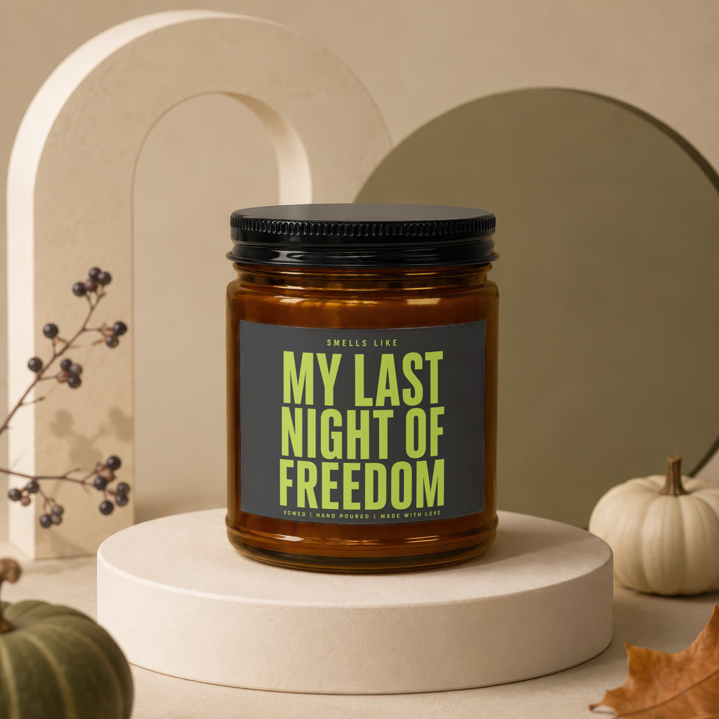 Amber jar candle with black lid labeled "My Last Night of Freedom."
