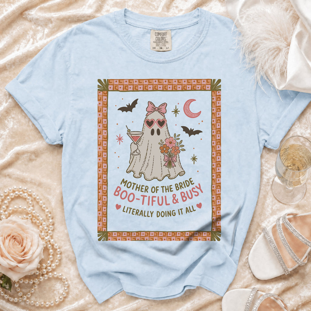 Light blue t-shirt with "Mother of the Bride Boo-tiful & Busy" ghost graphic.