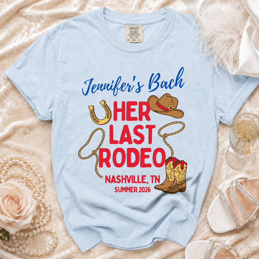 Light blue t-shirt with "Jennifer's Bach HER LAST RODEO NASHVILLE, TN SUMMER 2026" text and graphics.