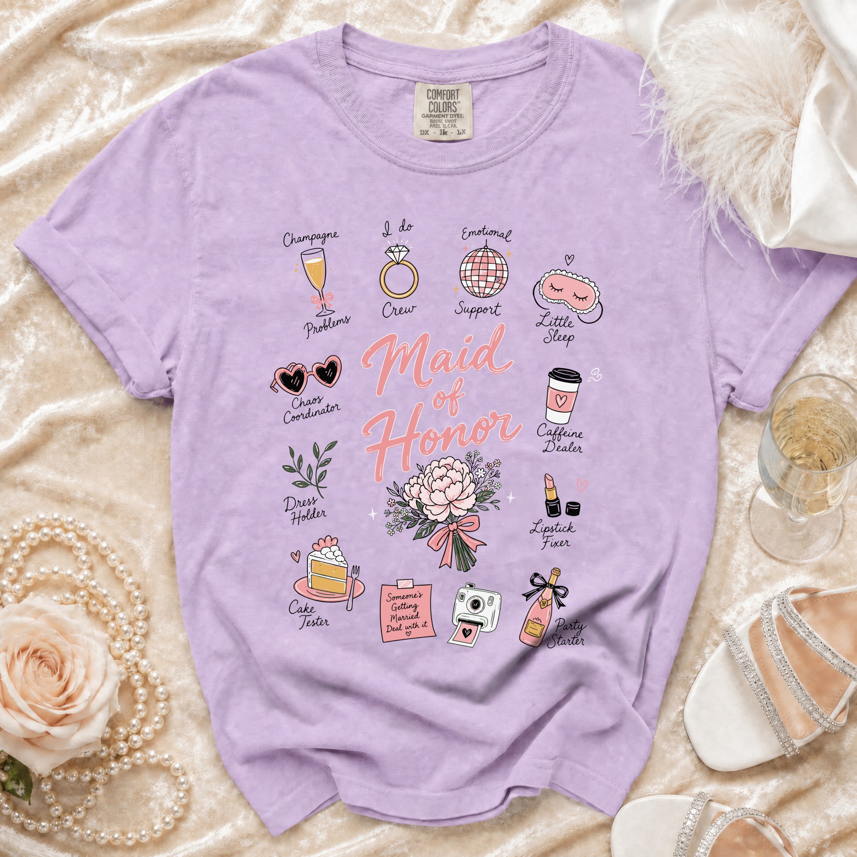 Lilac t-shirt with "Maid of Honor" and illustrated wedding-related icons.