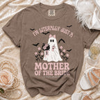 Brown t-shirt with a ghost holding flowers, bats, and text "I'm Literally Just a Mother of the Bride".