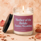 Lit candle with label "Mother of the Bride Entire Wedding Vowed".