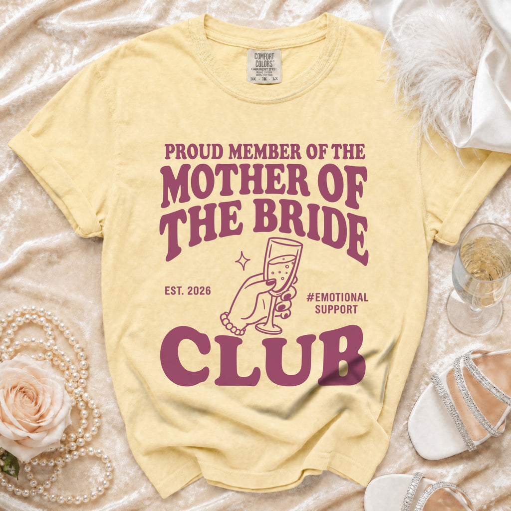 Yellow t-shirt with "Mother of the Bride Club" text and a champagne glass graphic.