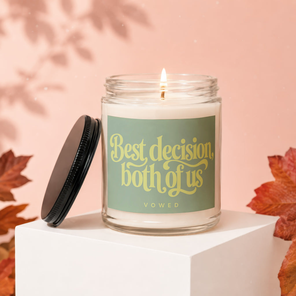 Glass candle with "Best decision, both of us vowed" on label.