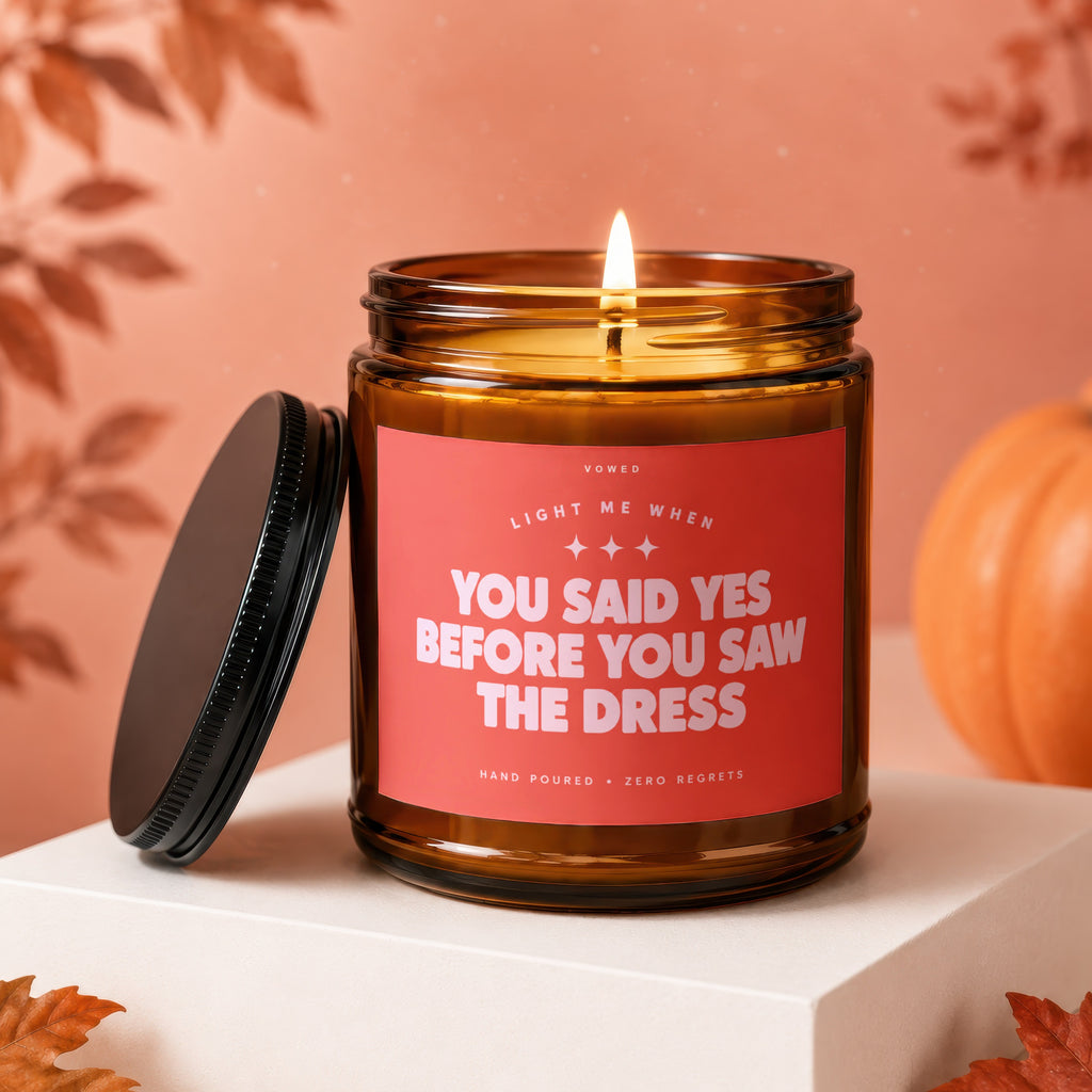 Amber candle with "You Said Yes Before You Saw The Dress" text.